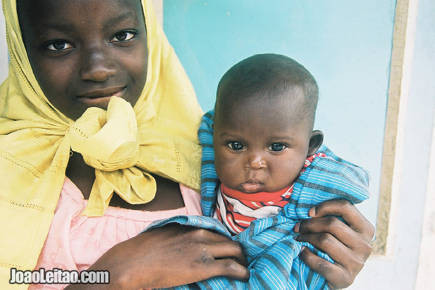 Girl and baby in Serekunda The Gambia West Africa