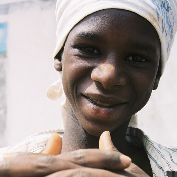 Photo of Boy with fingers crossed in Banjul, Gambia