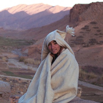 Young boy wearing a traditional anzar in the Atlas Mountains, Morocco - North Africa